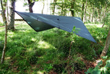 image of survival tarp being used in the wild  (136425537537)